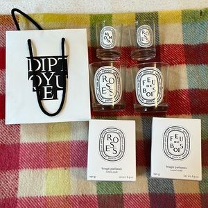 Lots of Diptyque empty votives